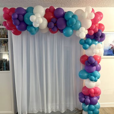 Rectangular Photo Backdrop by Boom Balloon Los Angeles, featuring a custom balloon garland and background cover for any event.