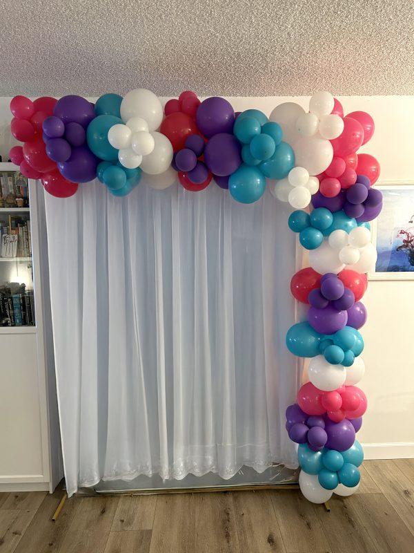 Rectangular Photo Backdrop by Boom Balloon Los Angeles, featuring a custom balloon garland and background cover for any event.